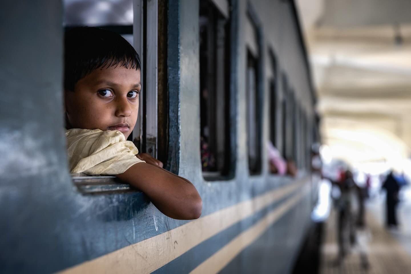 Wandering along the platform beside a train waiting to depart Dhaka Station, I was caught in the curious, still gaze of this child. 

#dhaka #bangladeshphotography #travelportrait #humanconnection #documentaryphoto #everydaybangladesh #facesoftheworl