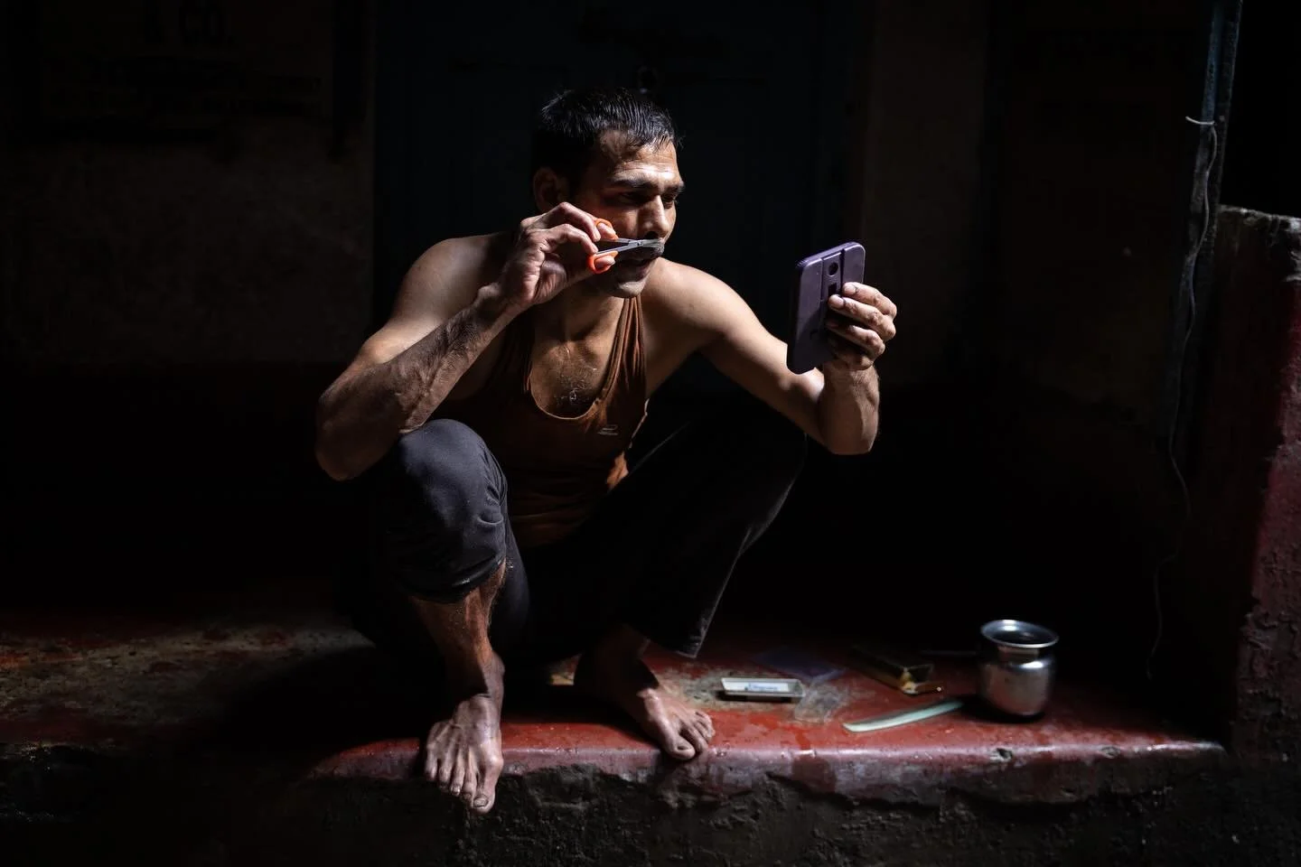 He has everything he needs. 

The Metal Market, Kolkata 2026

#myjourneywithacamera #documentaryphotography #kolkata #streetphotography #environmentalportrait
