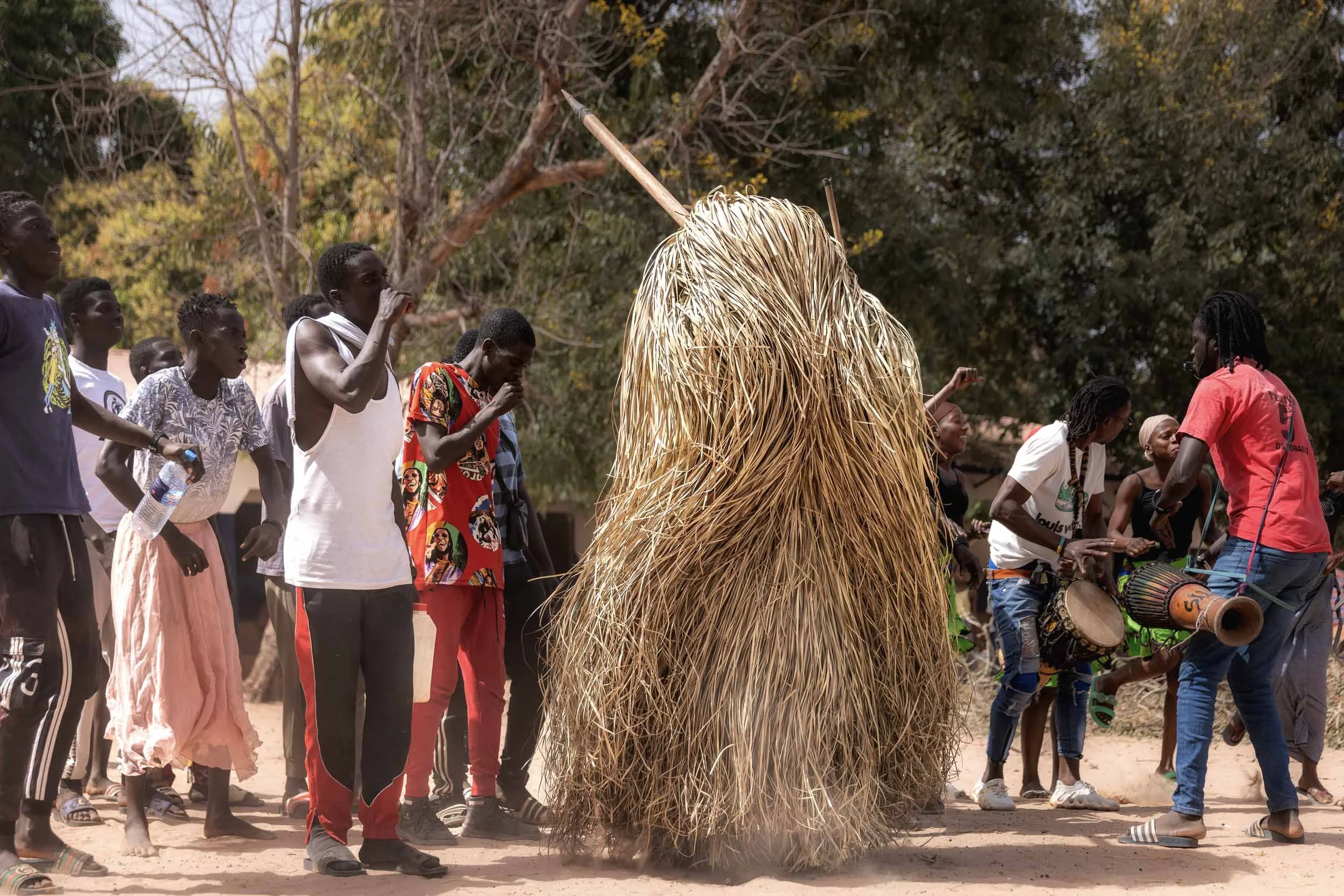 Kumpo and band of followers, Gambia