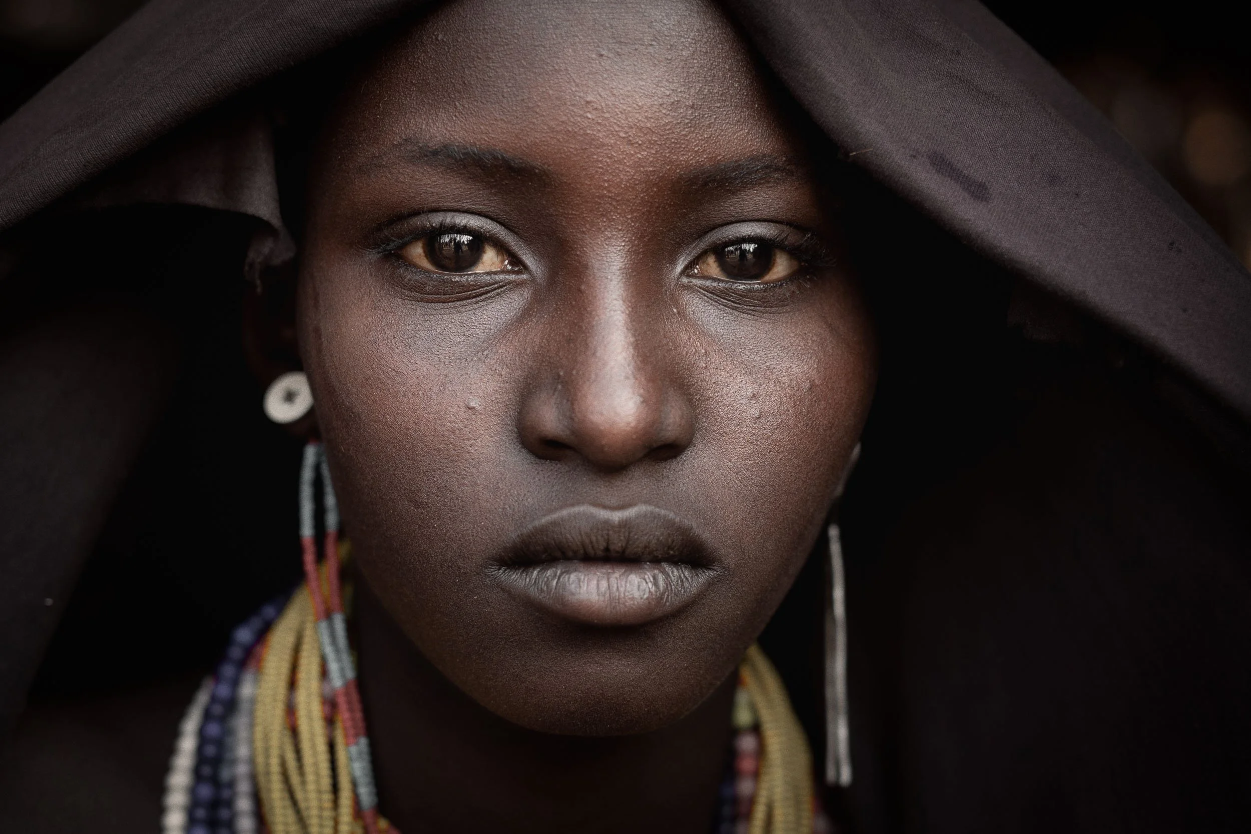 Facial portrait of Arbore girl, Ethiopia