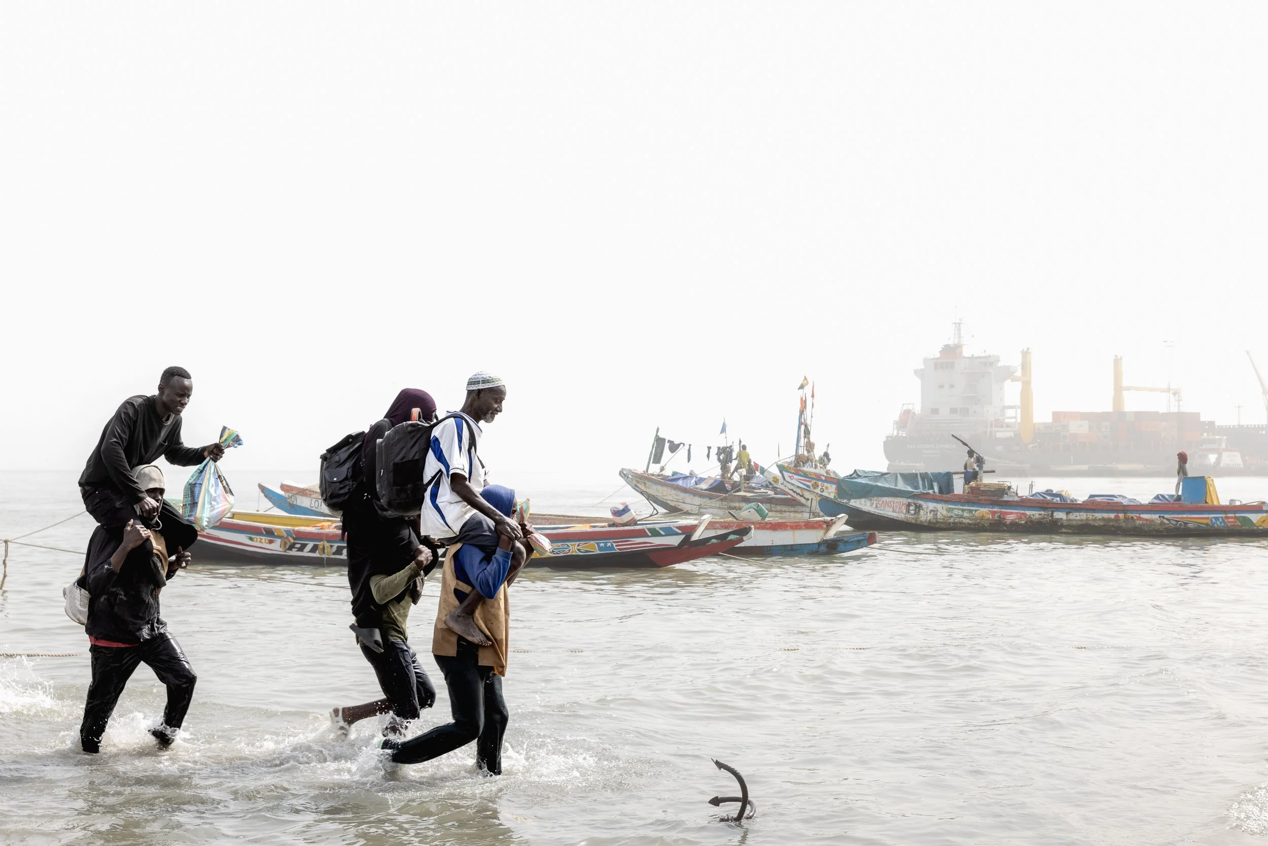 Disembarking from pirogues at Banjul