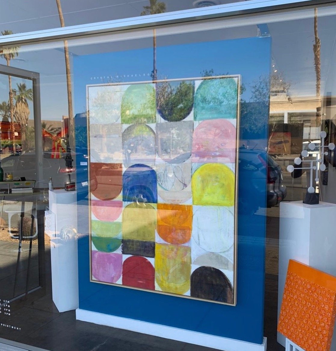 Crystal Michelson's art in window of Janssen Art Space