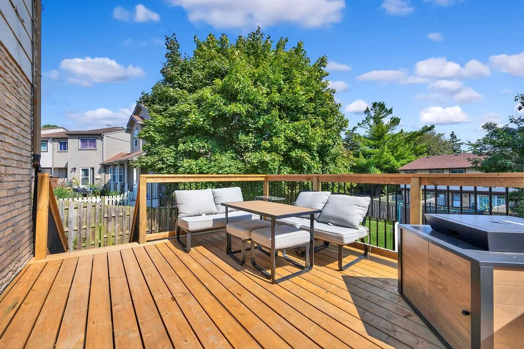 custom two-story wood deck built by Hawco Contracting