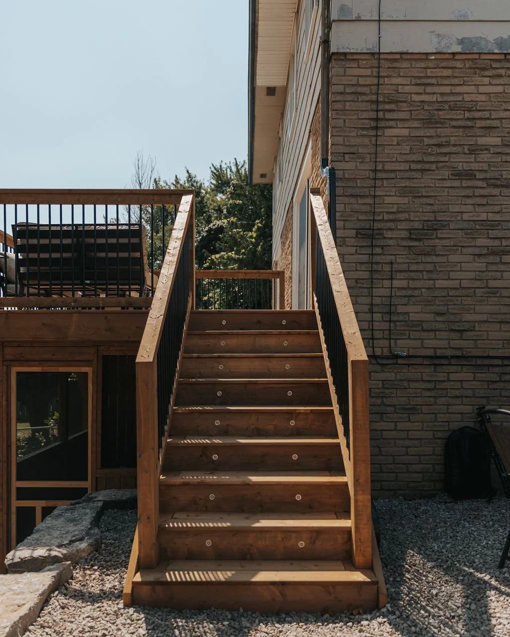 deck stairs installation in Waterloo backyard