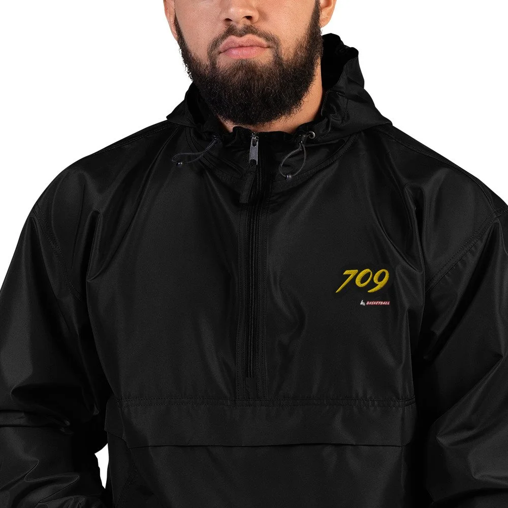 embroidered-champion-packable-jacket-black-zoomed-in-64861c5d4e3f4.jpg