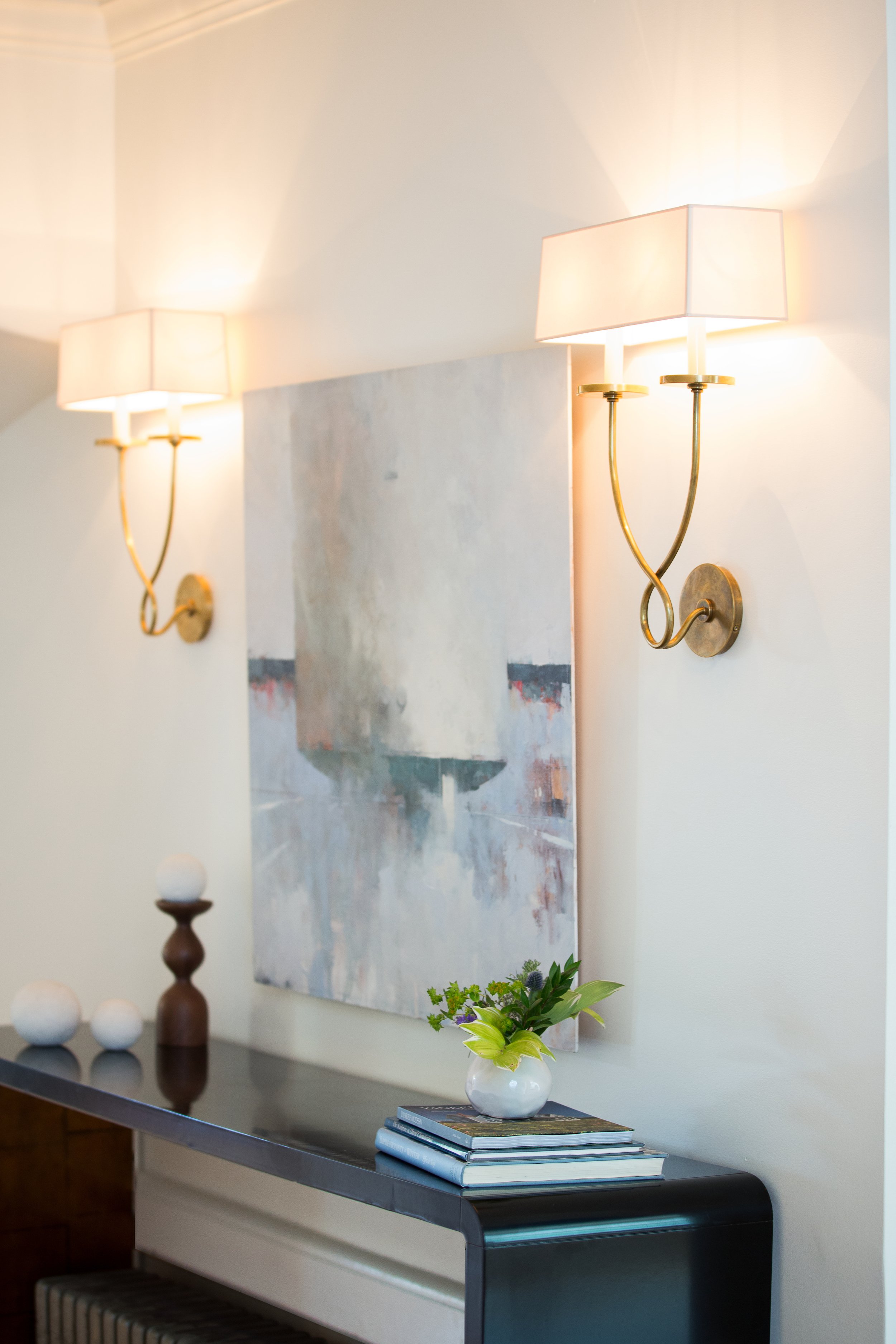 04-img-modern-console-table-brass-sconces.jpg