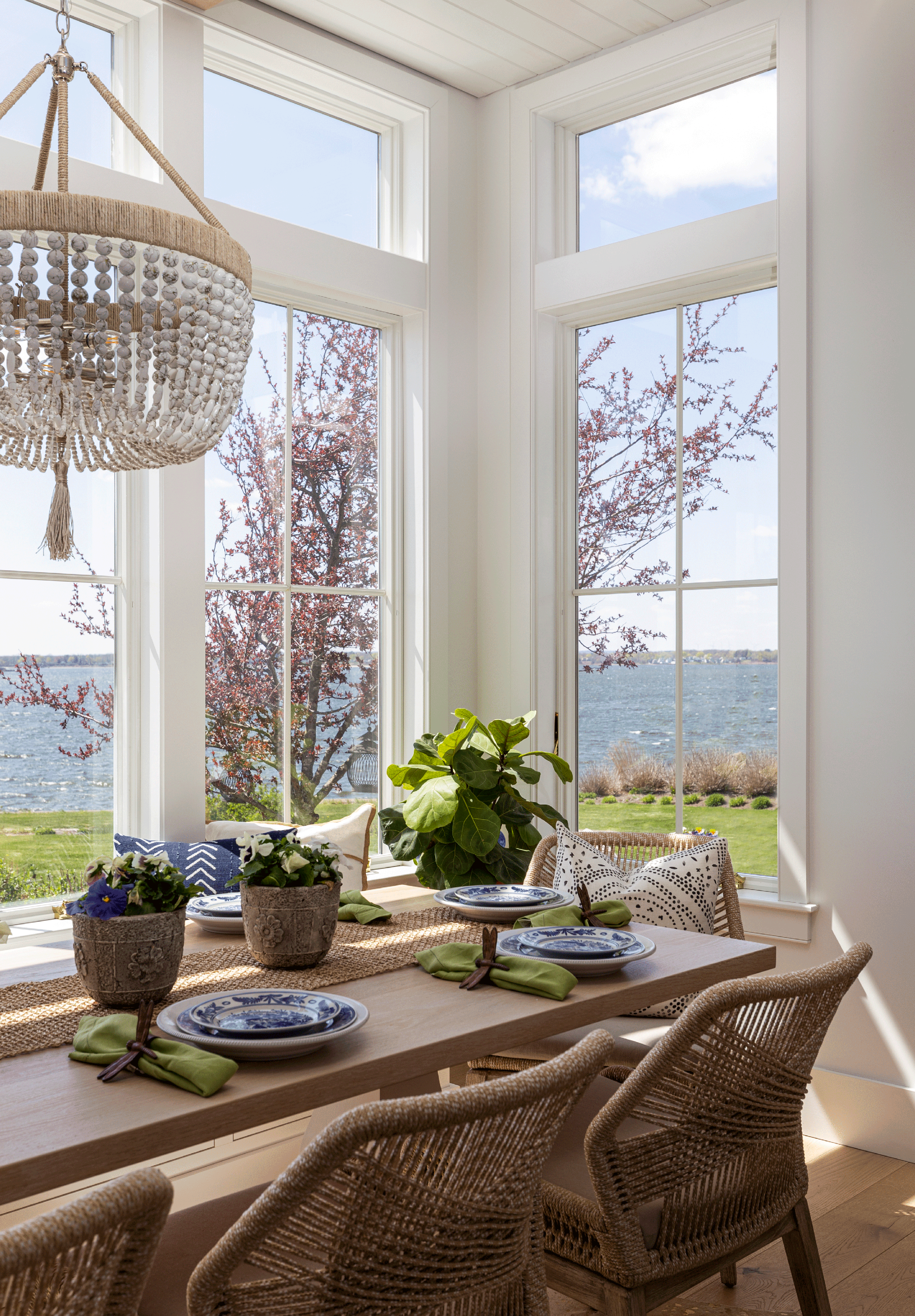 Dining in alcove; Natural wood and woven pallette.