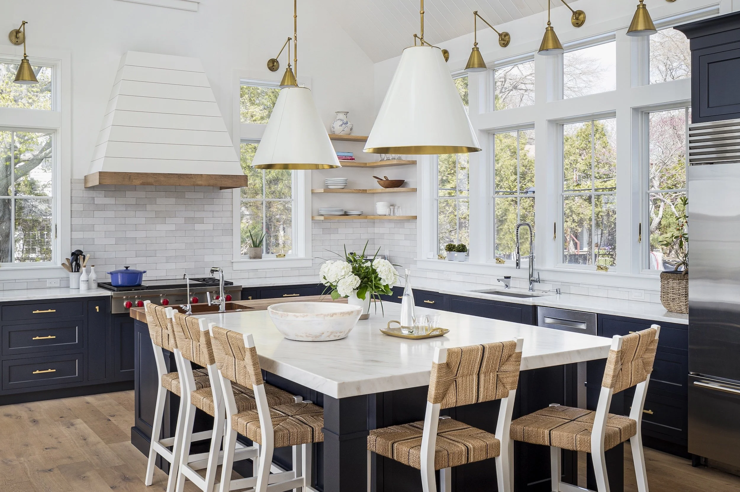Coastal kitchen with brass, navy and white pallette