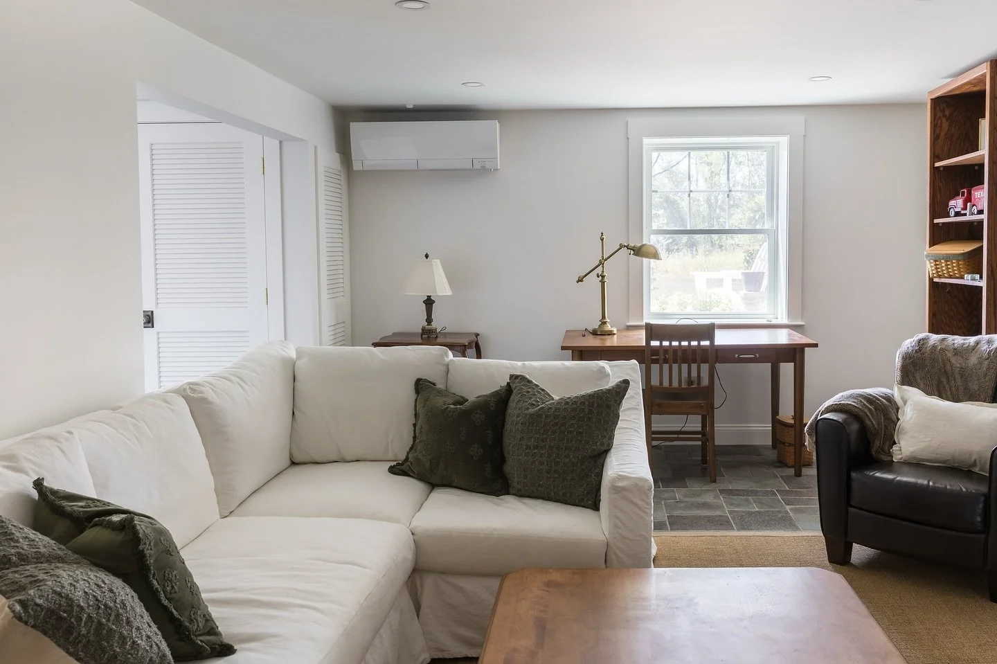 We recently wrapped up an incredible basement renovation in West Newbury. Our clients were looking for a more functional space, and our design delivered with new insulation, walls, trim, ceiling, and custom built-ins. It came together perfectly and o