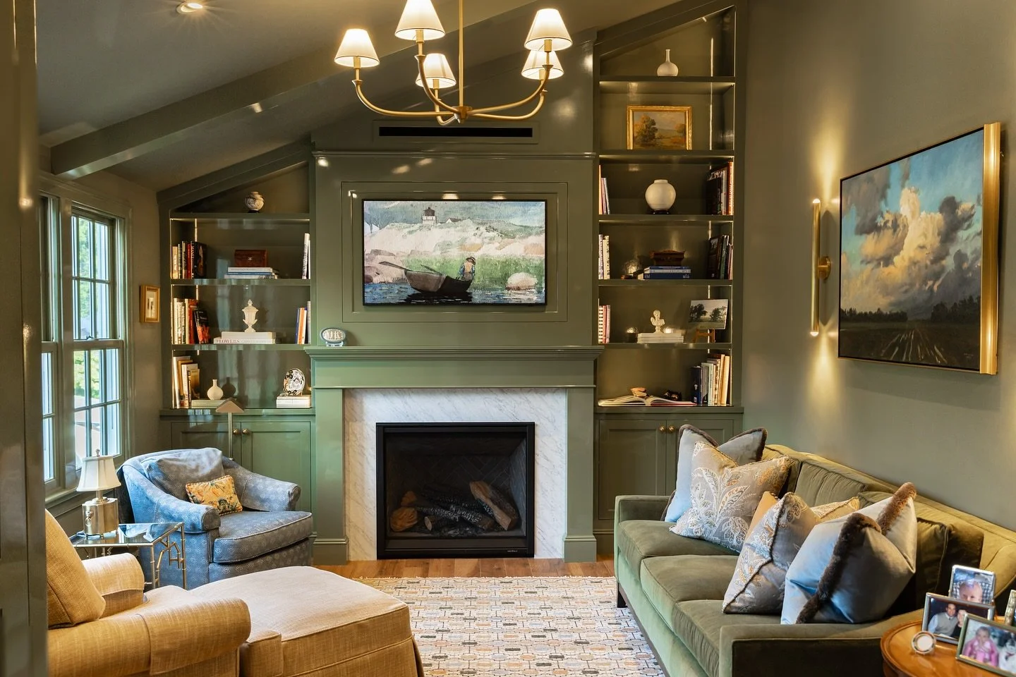 What a transformation for this sunroom! We took this space down to the studs, removing the old fireplace and two layers of flooring, before rebuilding it into this stunning masterpiece.

The high-gloss &ldquo;Gal&aacute;pagos Green&rdquo; by @benjami