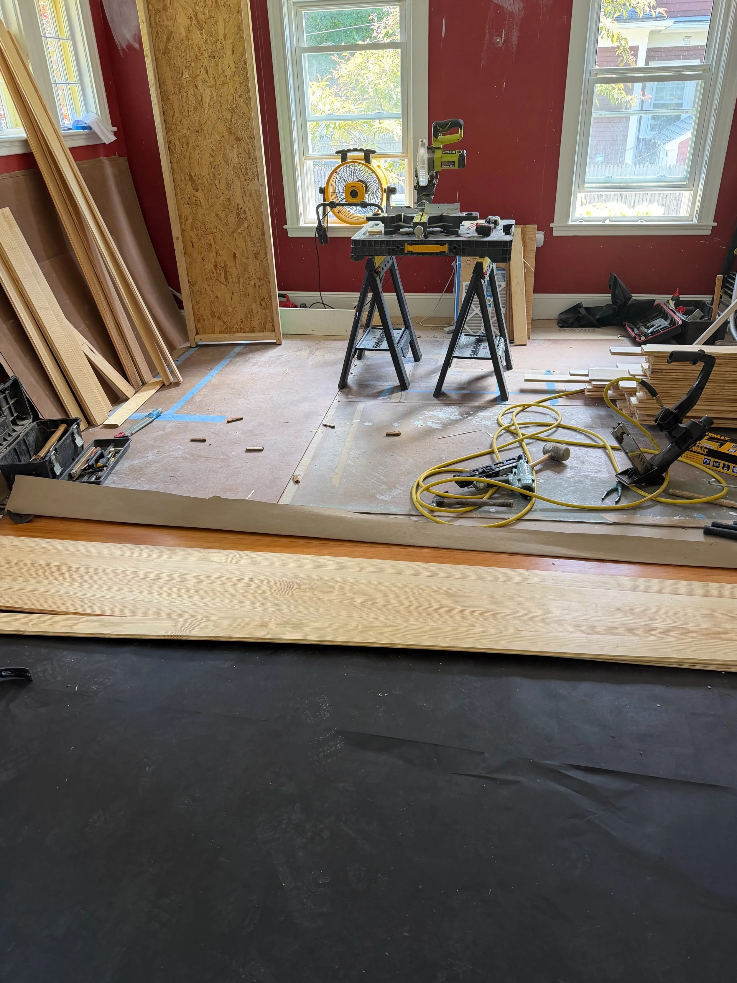 Next up in this first-floor renovation: the flooring.

Our friends at @saulnierfloors installed the heart pine wood flooring, then sanded and stained the new floors in the kitchen, bathroom, laundry room, and office. Since the rest of the home alread