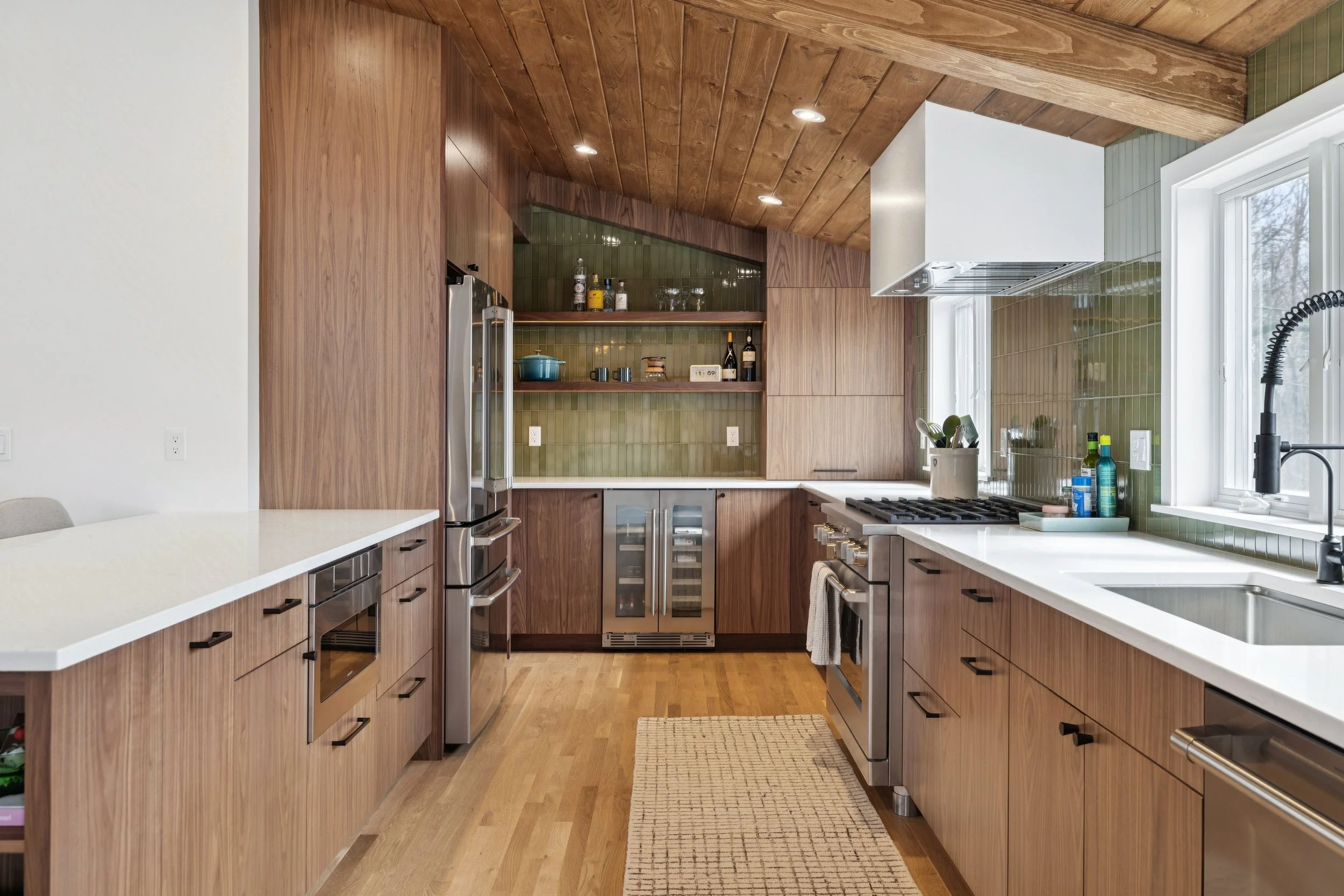 Mid century modern kitchen with green tile