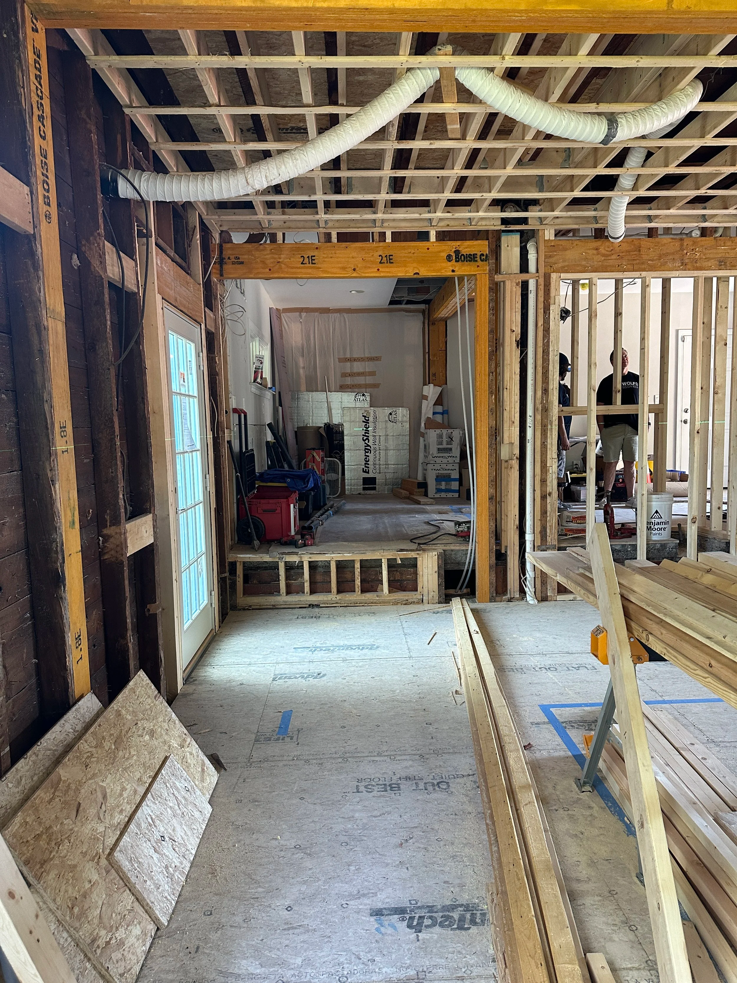 open room with exposed walls