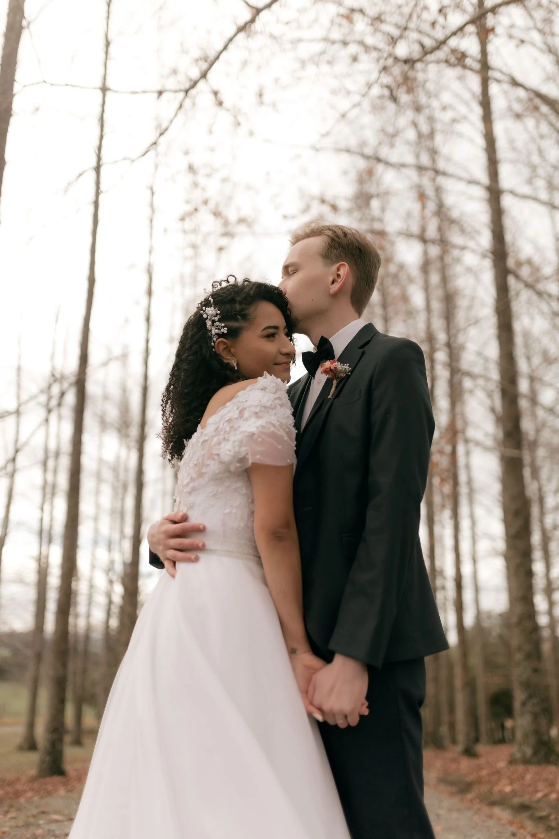Winter wedding couple in an elegant holiday setting
