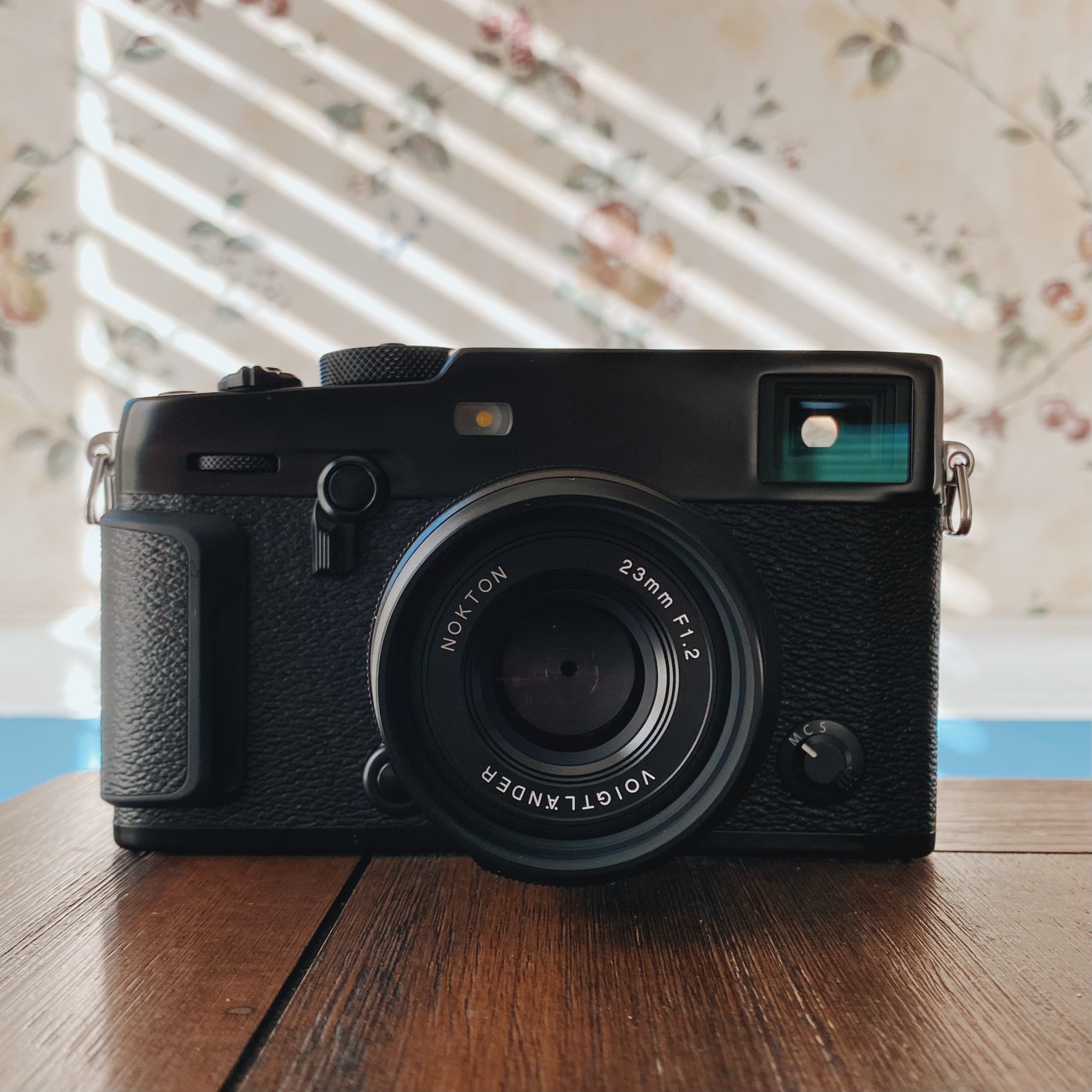 Fujifilm X-Pro3 camera on a table in soft window light