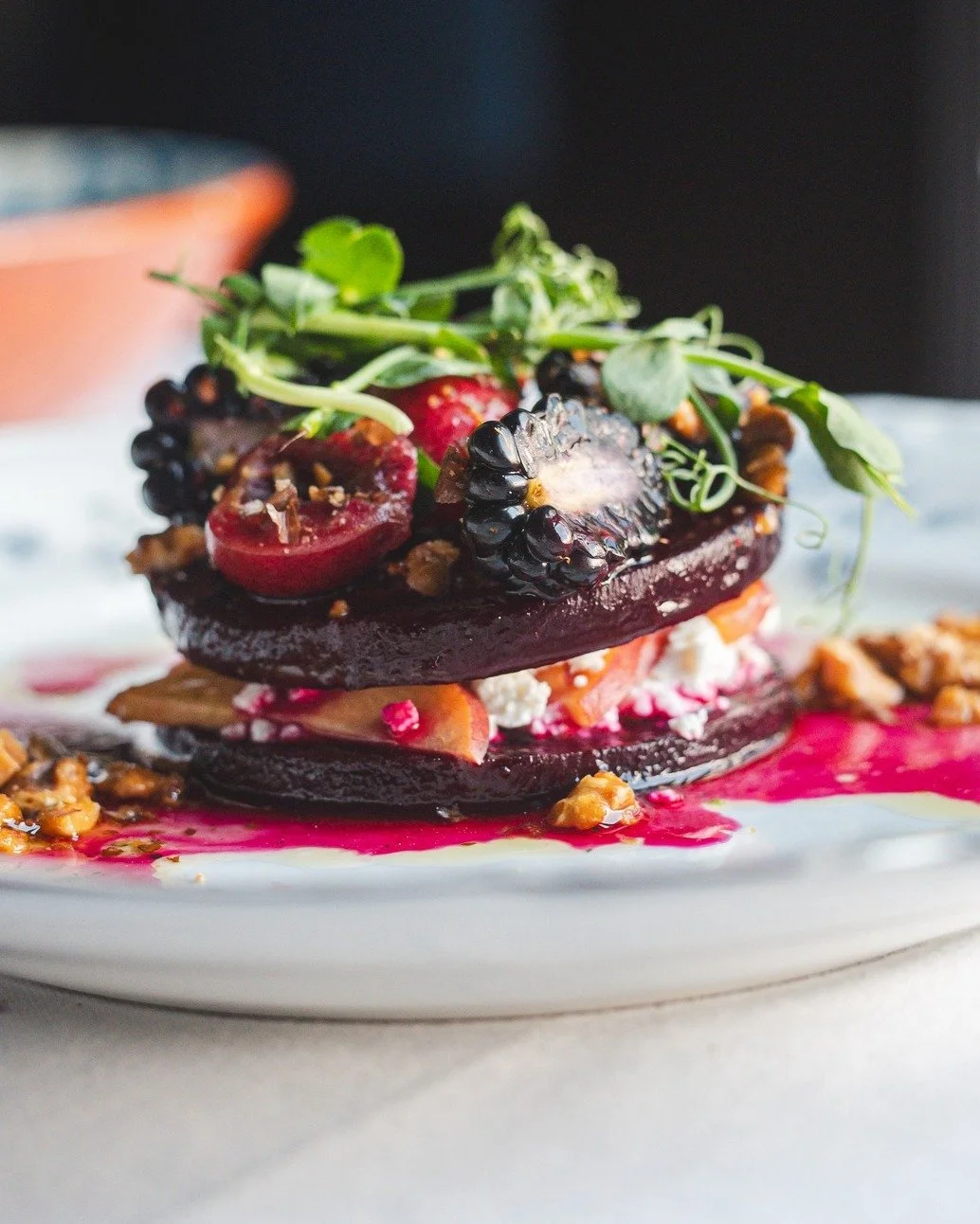 Don't like beets? Think again! 

We know beets are usually a "you either love 'em or you hate 'em" kinda food, but not this time. Our Beet &amp; Stone Fruit Salad has both beet-lovers and critics coming back for more 🤤 Honey goat cheese an