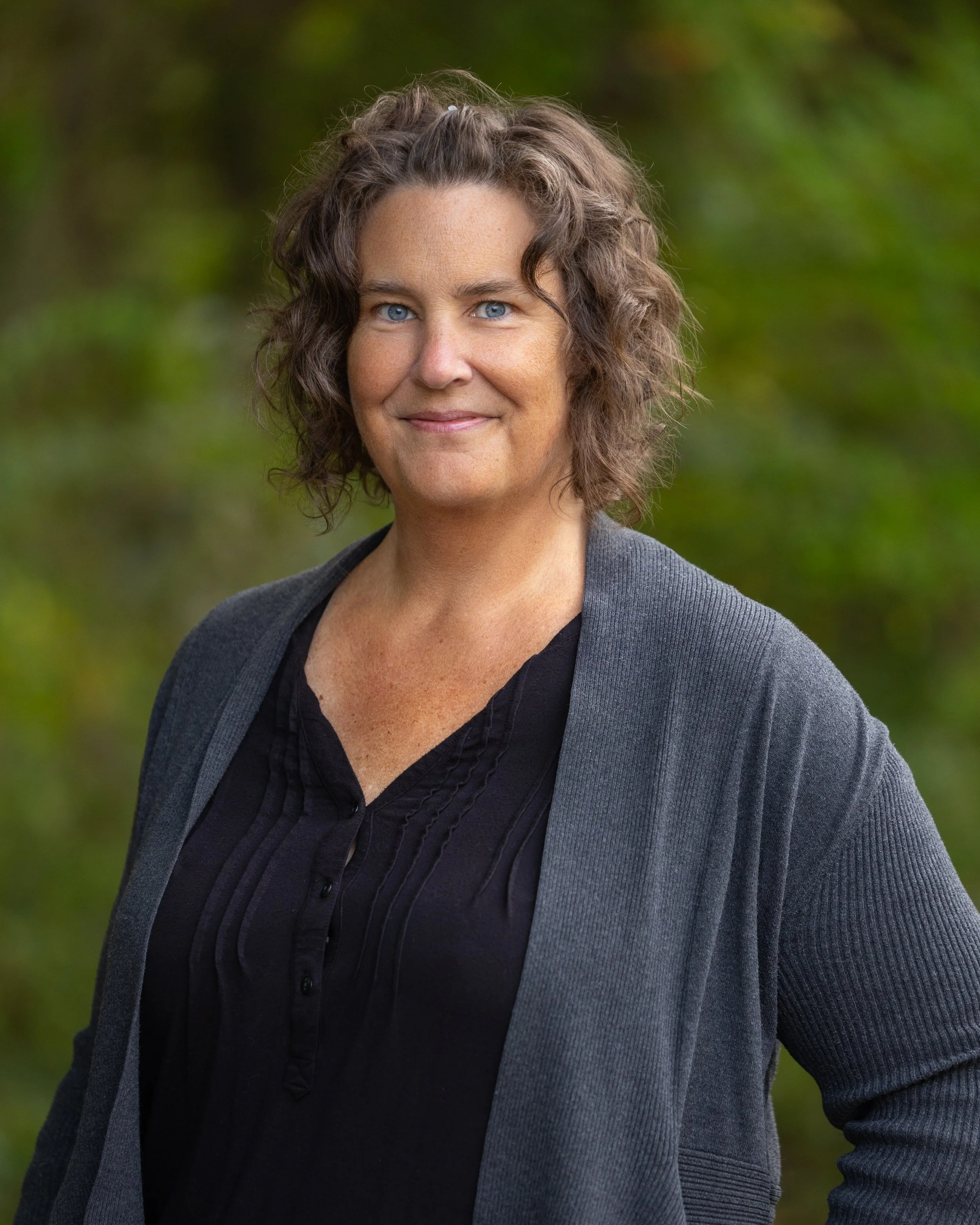 Smiling Executive Director.