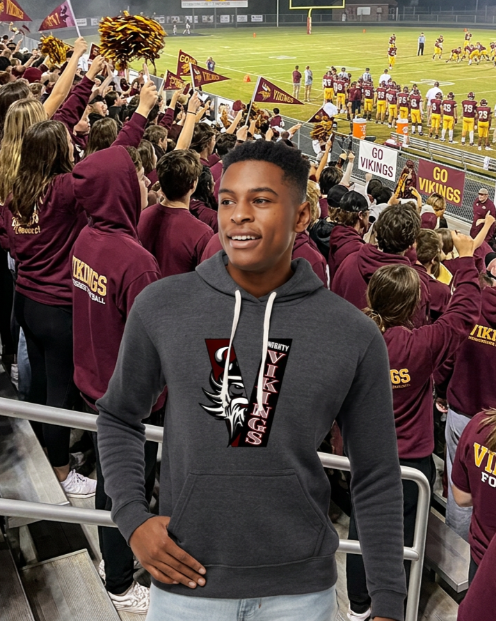Firefly_Gemini+Flash_create+a+mockup+of+a+man+wearing+this+hoodie+at+a+tennessee+high+school+football+game+296314.png