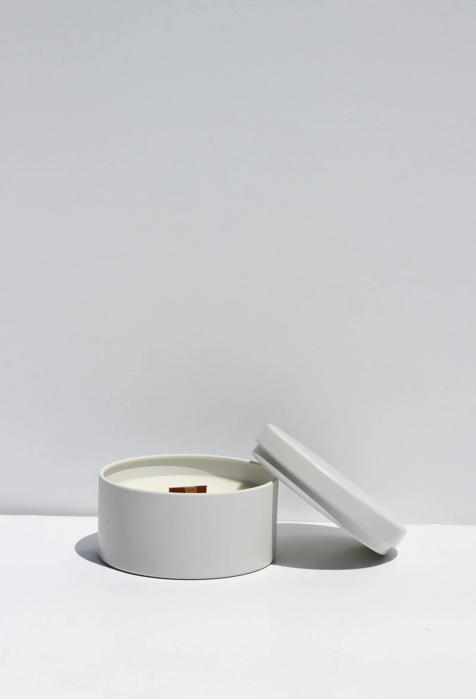 Heirloom Tomatoe soy wax candle in a cream travel tin with wooden wick by Lune et Soleil