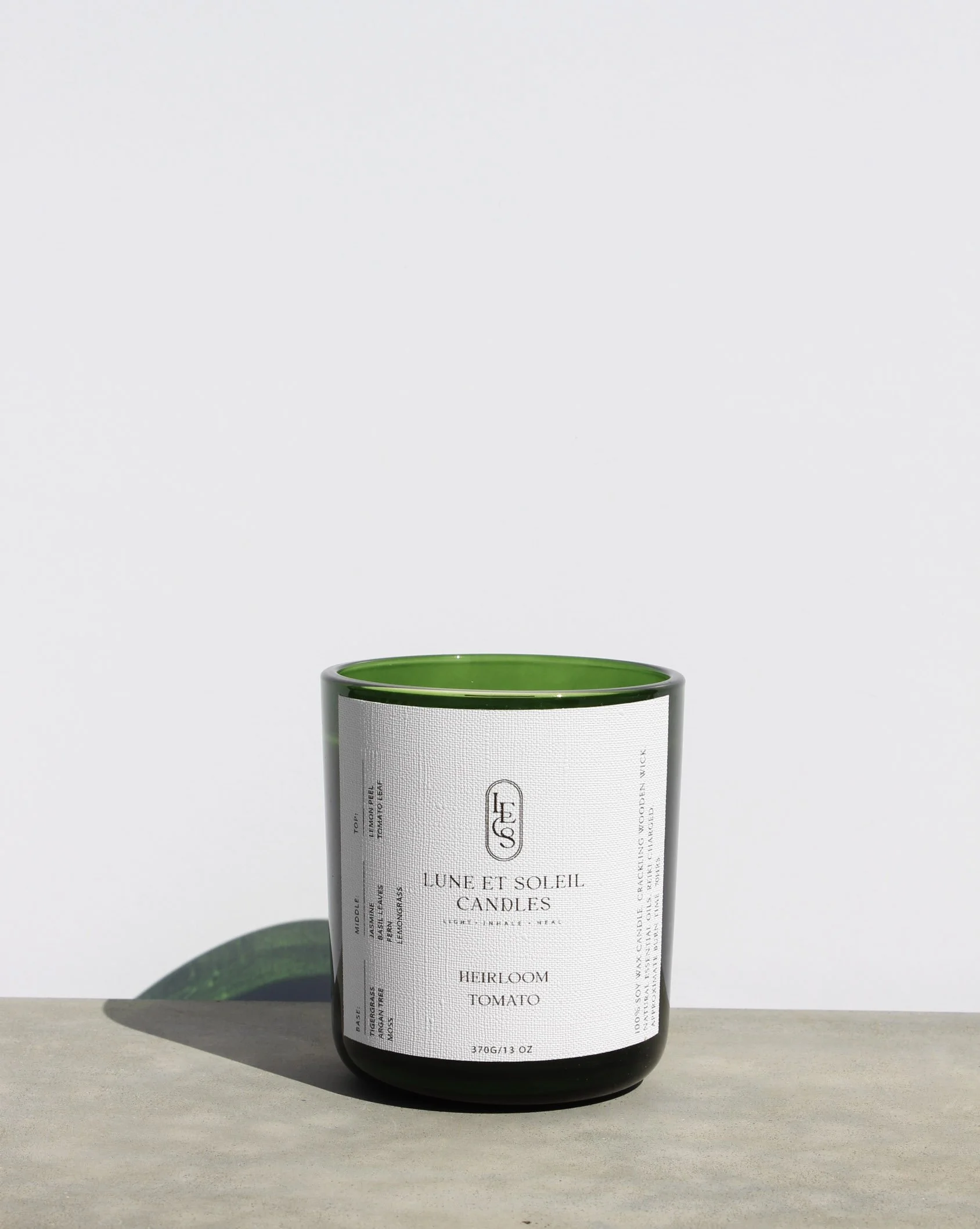 Heirloom Tomato soy wax candle in a green glass vessel by Lune et Soleil