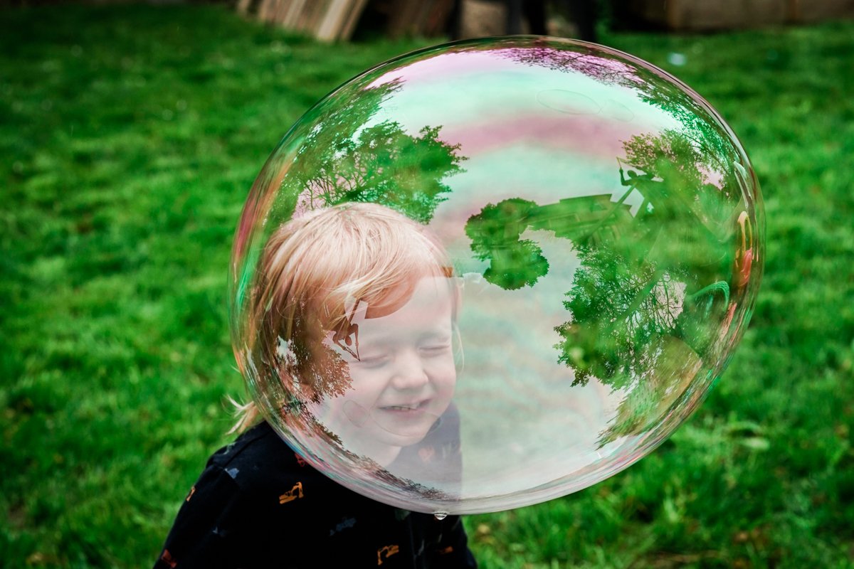 Child Kid Playing with Bubbles