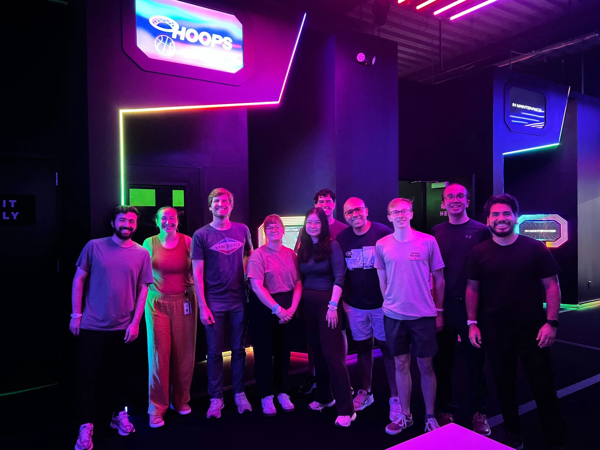 Lab outing to Activate St. Louis, May 2026. From left: Nisar, Cass, Mike, Holly, Jing, AJ, Edwin, Zack, Yu-Liang, and Wilber