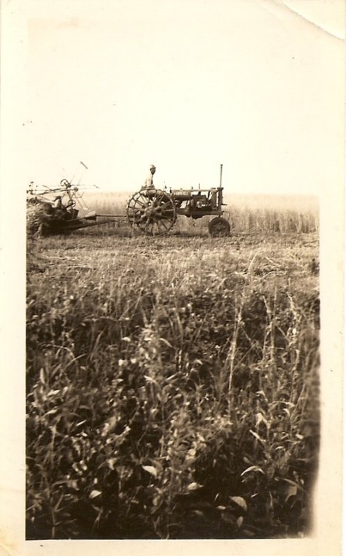  Old M Tractor, bought during the war. Carter. No rubber tires, rationed for war 