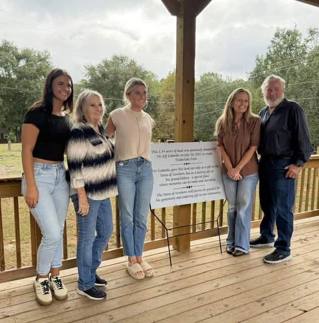 Park/Trail dedication to Mr. Eubanks for the donation of the land for the park/trail. Pictured is Mr. Eubanks, his wife, daughter and grand-children.