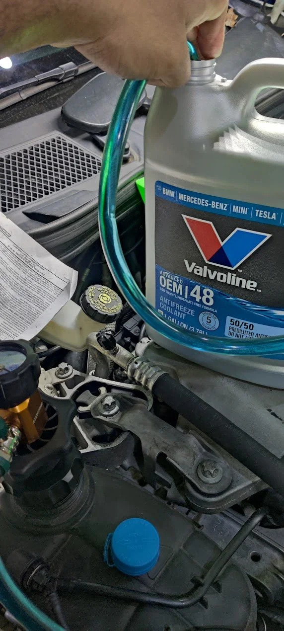 Several BMWs in for service