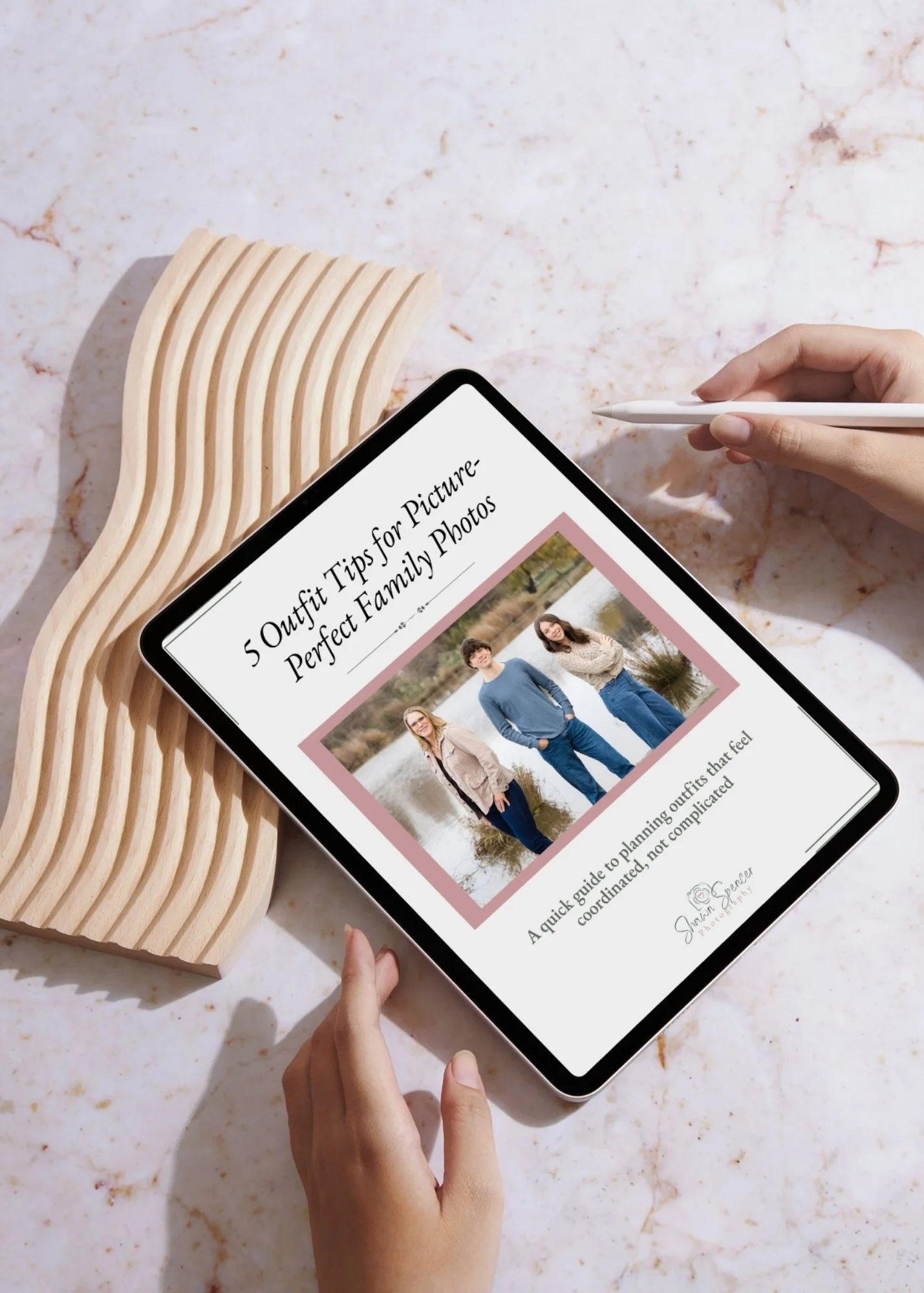 Tablet mockup showing the “Picture-Perfect Outfits: 5 Family Photo Style Tips” family guide on screen.