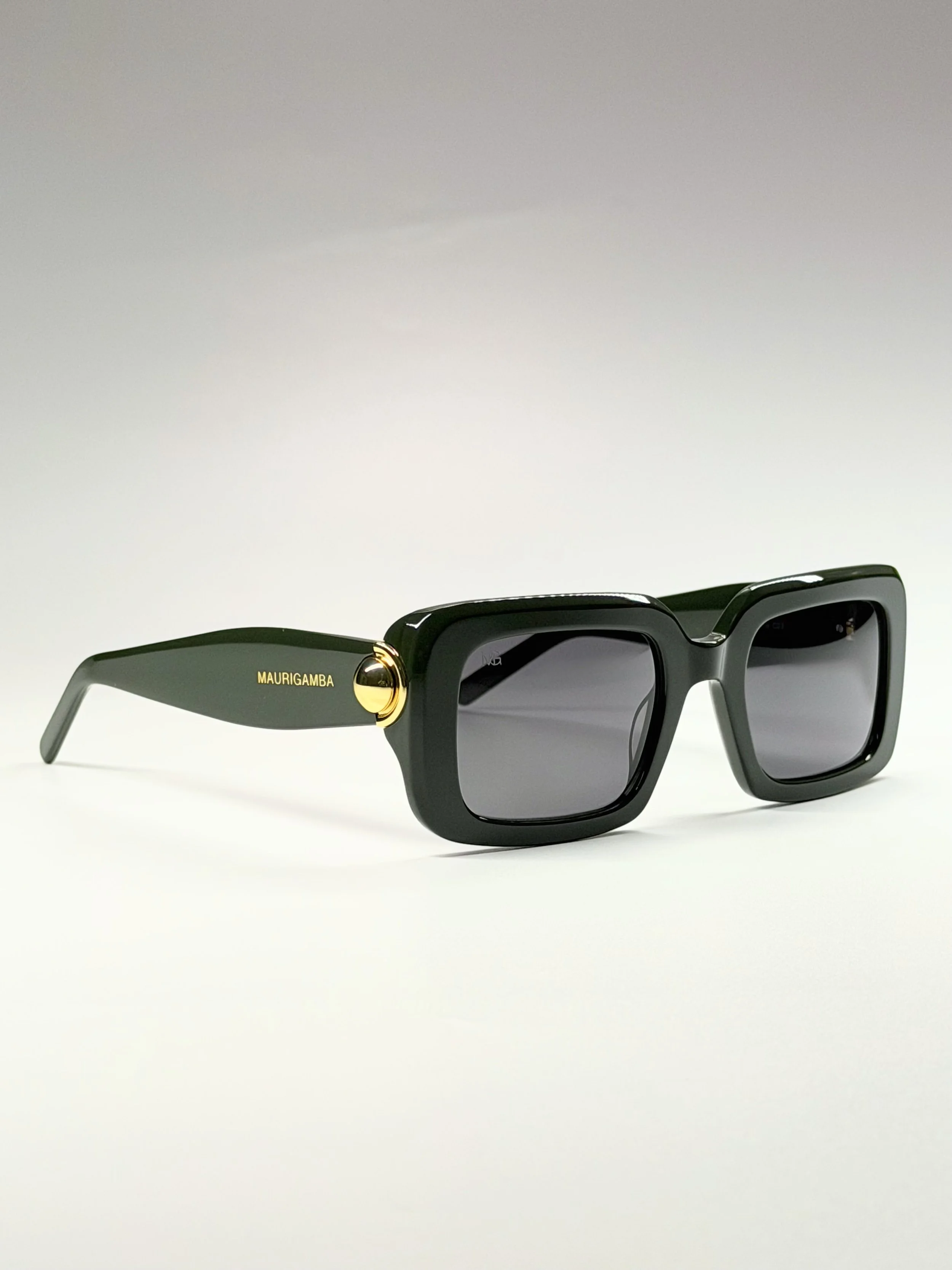 Oversized Silhouette · Sculpted Acetate Temples · Polished Gold Hardware