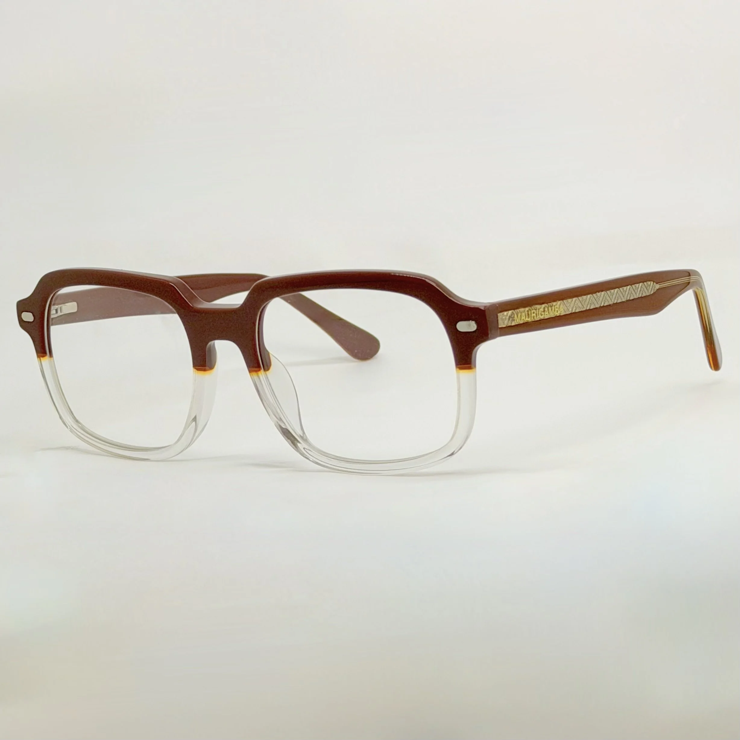 Premium Handcrafted Acetate · Signature Temple Detail · Modern Luxury