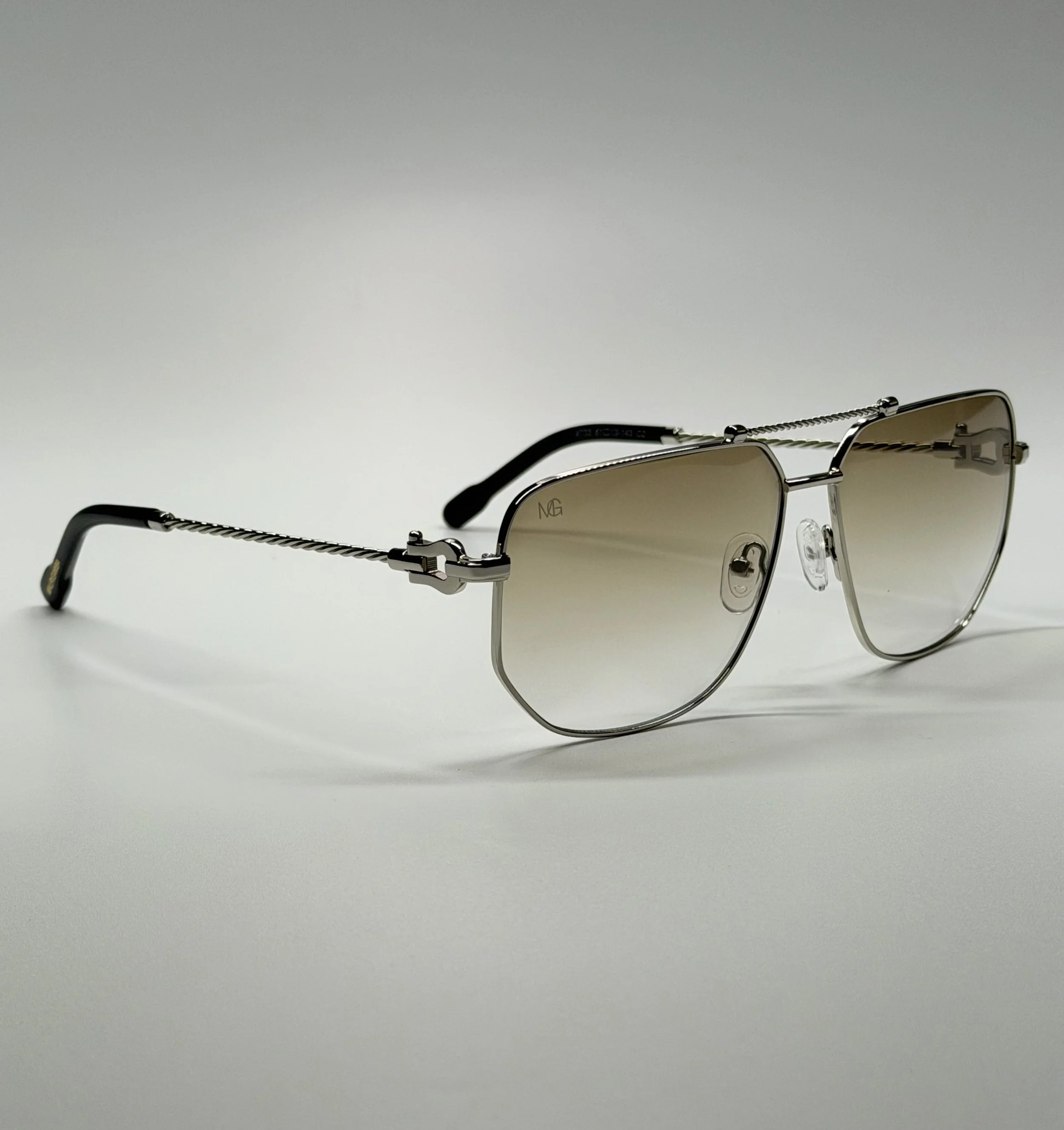 Twisted Metal Temples · Black Temple Tips · Refined Modern Design