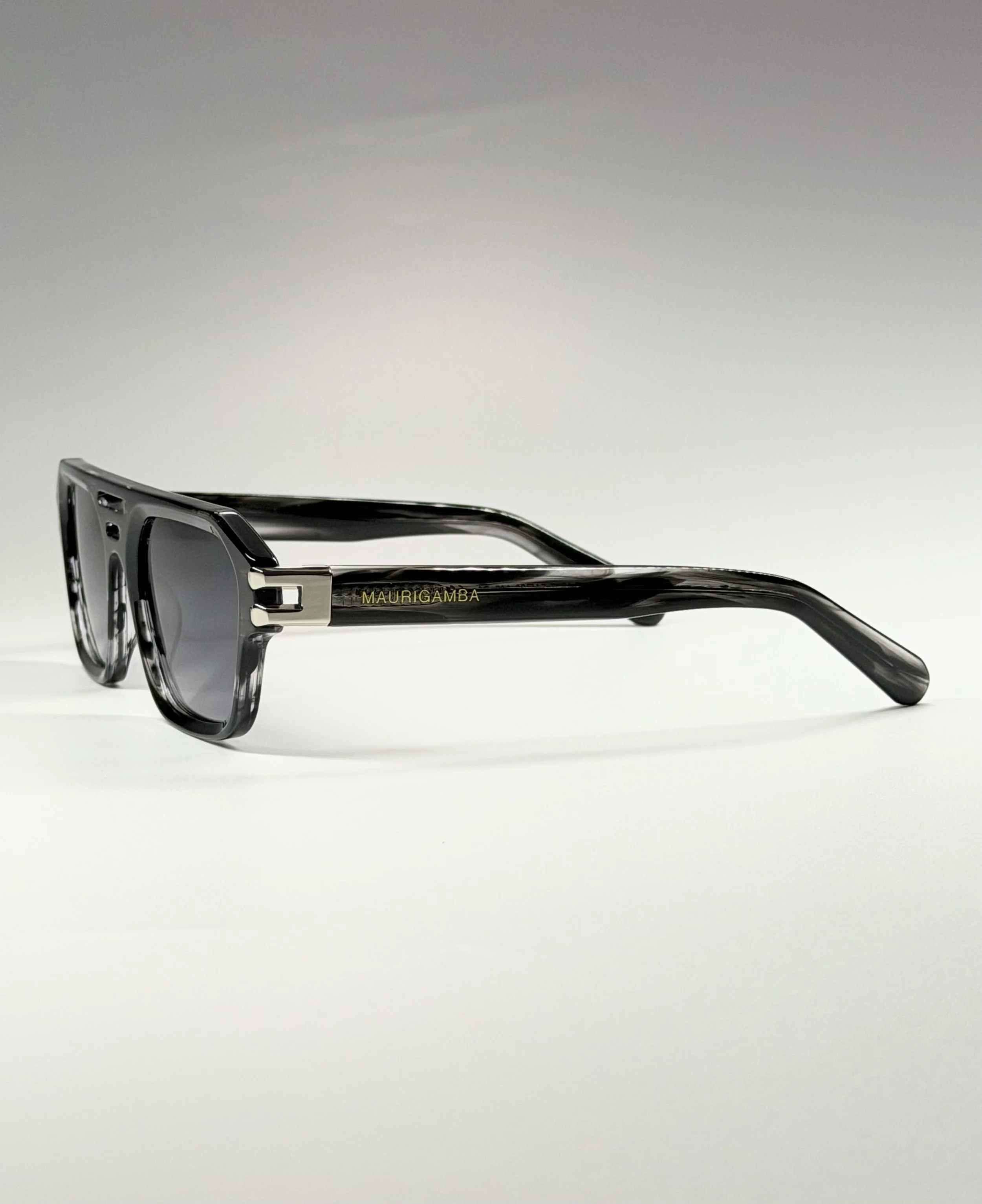 Bold Architectural Design · Premium Acetate Construction · Contemporary Luxury Eyewear