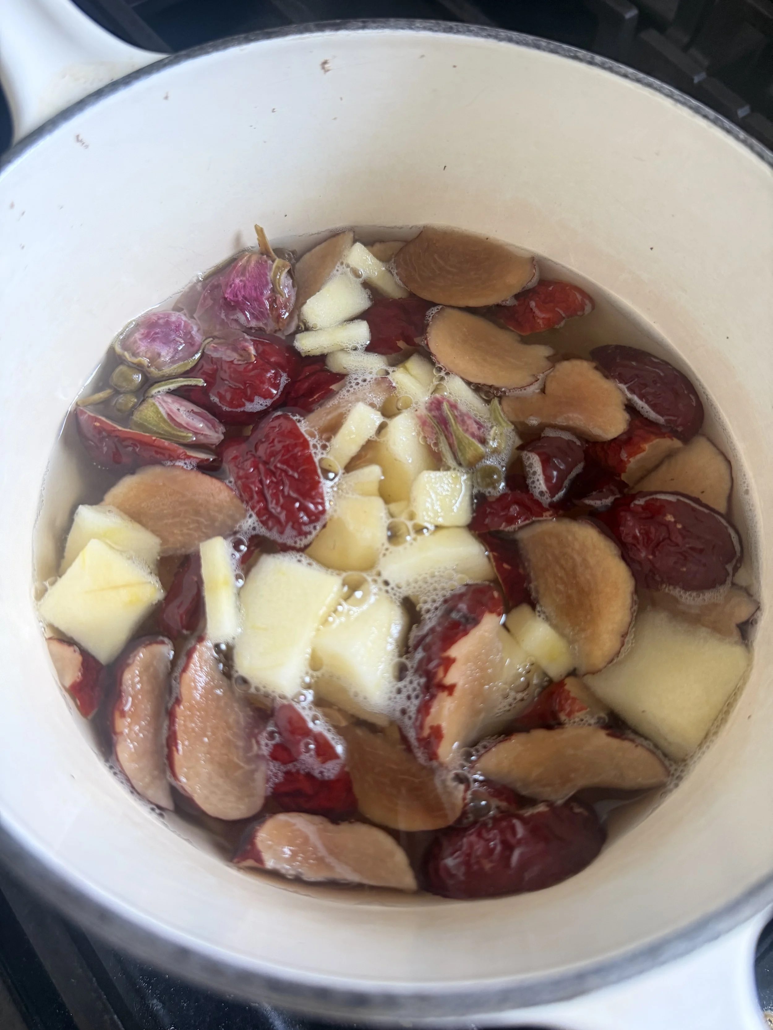 Rose Jujube Dessert Tea Simmering in a pot