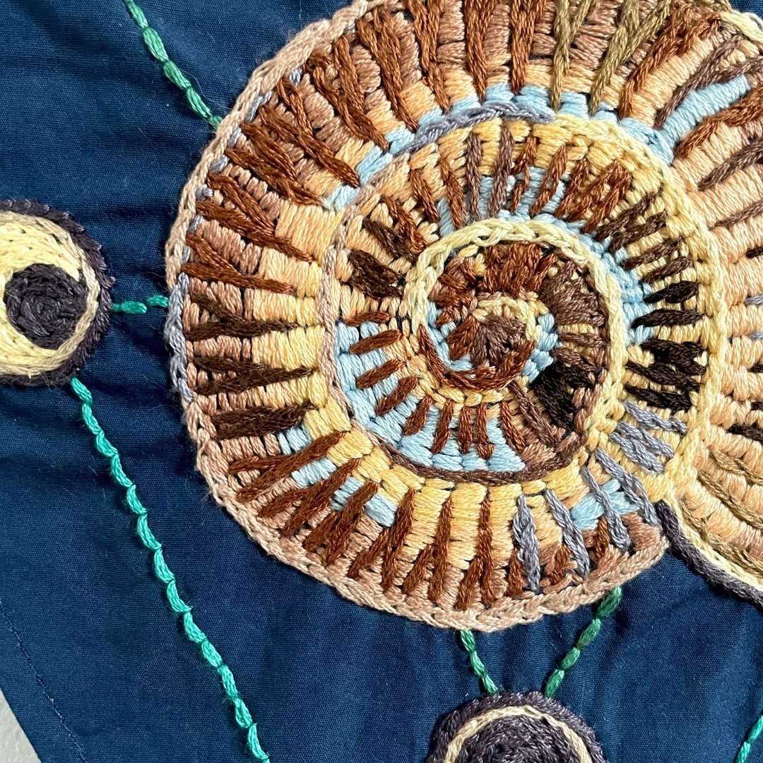 Moon Spiral, embroidered textile

The shape of the spiral is found throughout nature, from an ammonite's shell to the whirling cosmic dance of the solar system, screaming through space. Its symbolism evokes the &quot;repetitive rhythm of life, the cy