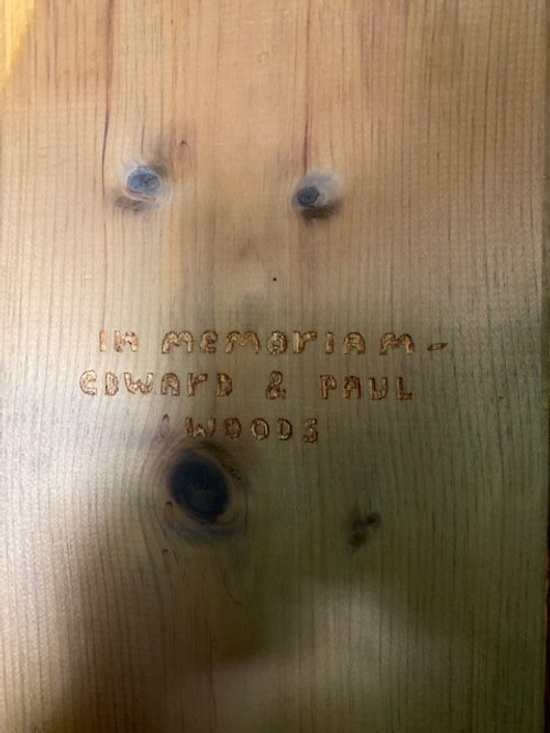 Recognition to the builder carved into the wood wall in the house by a resident skier. Edward Fenton Wood Jr., the Carpenter and Builder of the Woods House.