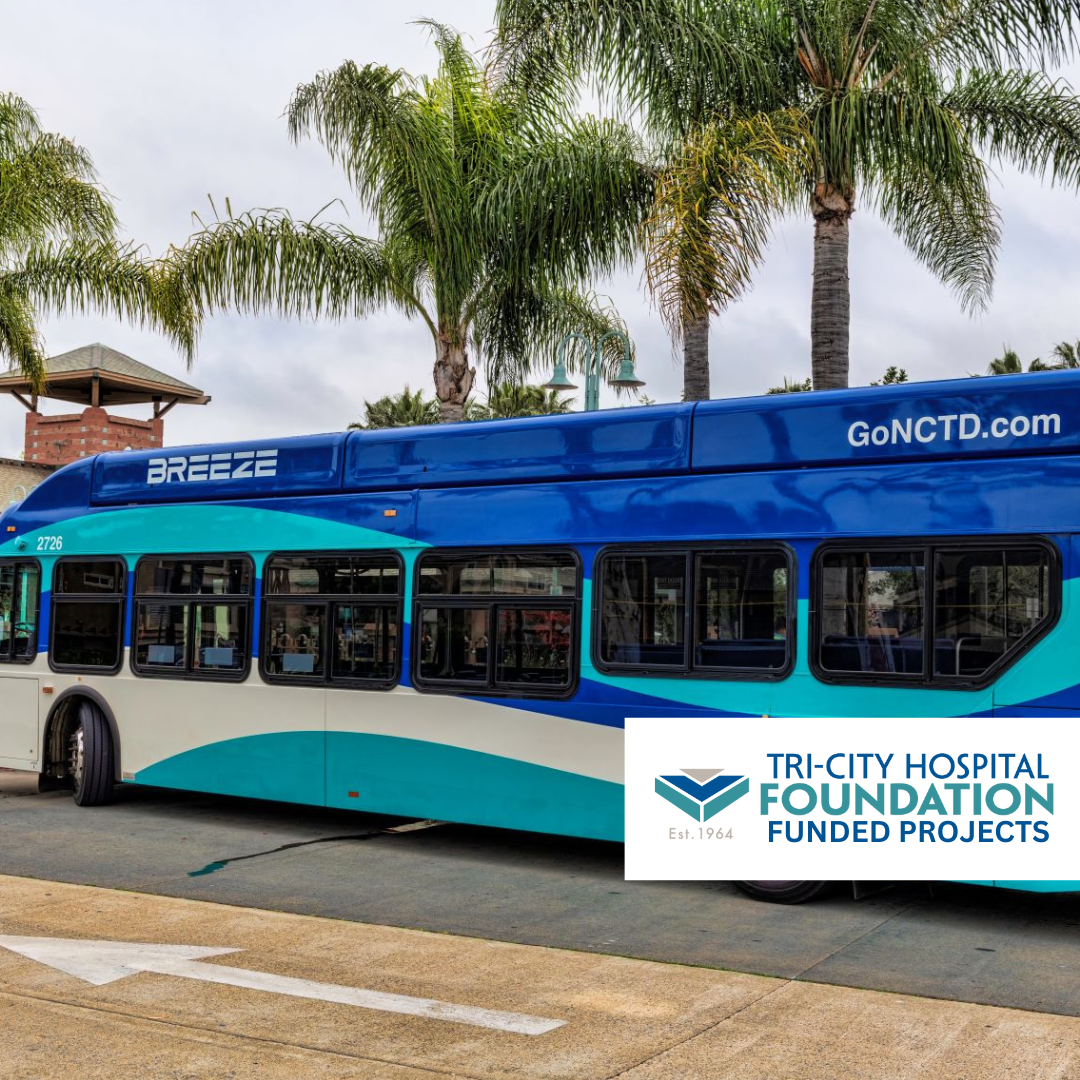 A blue and white bus with the branding 'BREEZE' and the website 'GoNCTD.com' parked near palm trees, with the logo of Tri-City Hospital Foundation funded projects in the lower right corner.