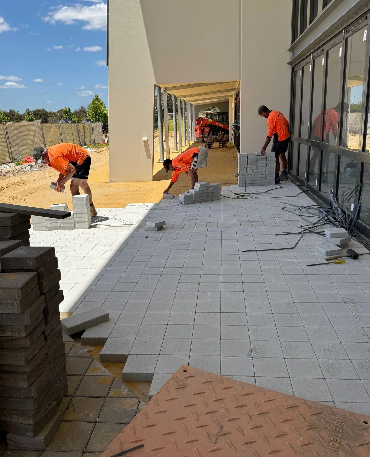 🚧 Paving the way! On-site at Carey Baptist College, laying down paving that&rsquo;s set to complete the look and functionality of the new building.⁠
⁠
From careful prep to smooth finishes, every step is about precision and quality. Excited to see th