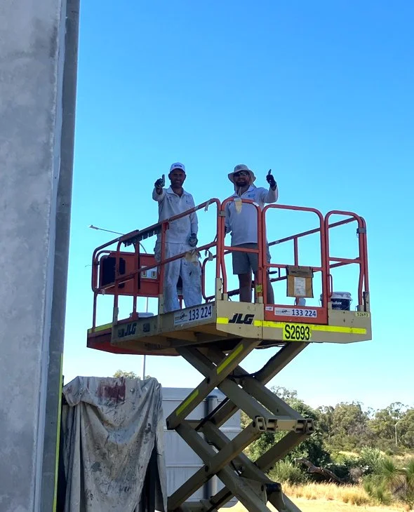Reaching new heights! 🚀 Fadhel and Sebastian apply textured coating to the towering walls of our warehouse project using an EWP. Safety, skill, and style all in one👍🏼⁠
⁠
#ClassicContractors #PerthPainters #CommercialPainters #WarehouseProject  #Du