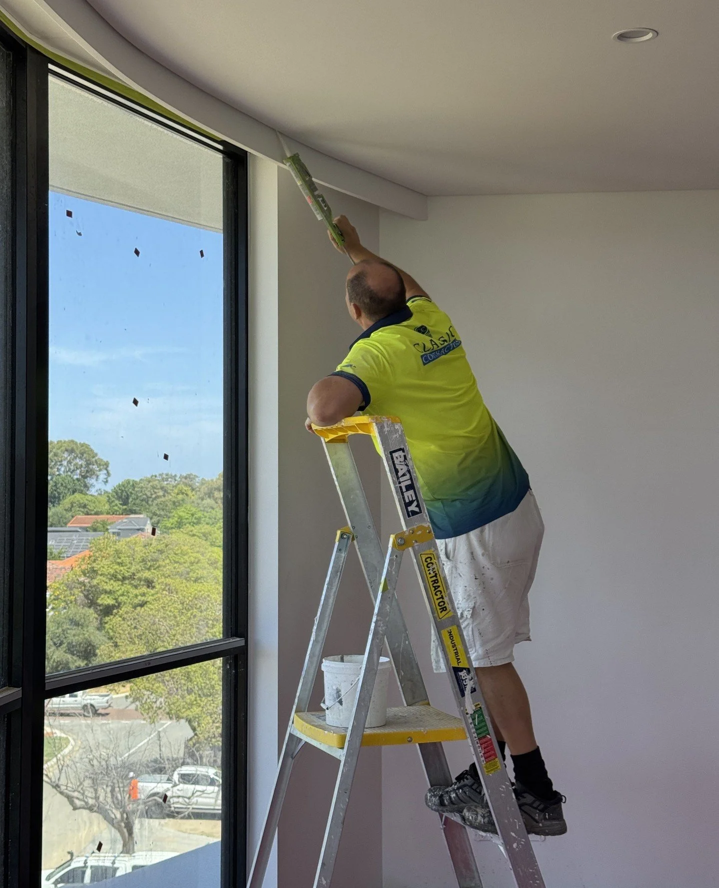 Precision work underway at our Nedlands project. Yuri gapping the shadow line ceiling to achieve clean junctions and a sharp architectural finish. Attention to detail makes a difference! ⁠
⁠
#ClassicContractors #PerthPainters #CommercialPainters #Res