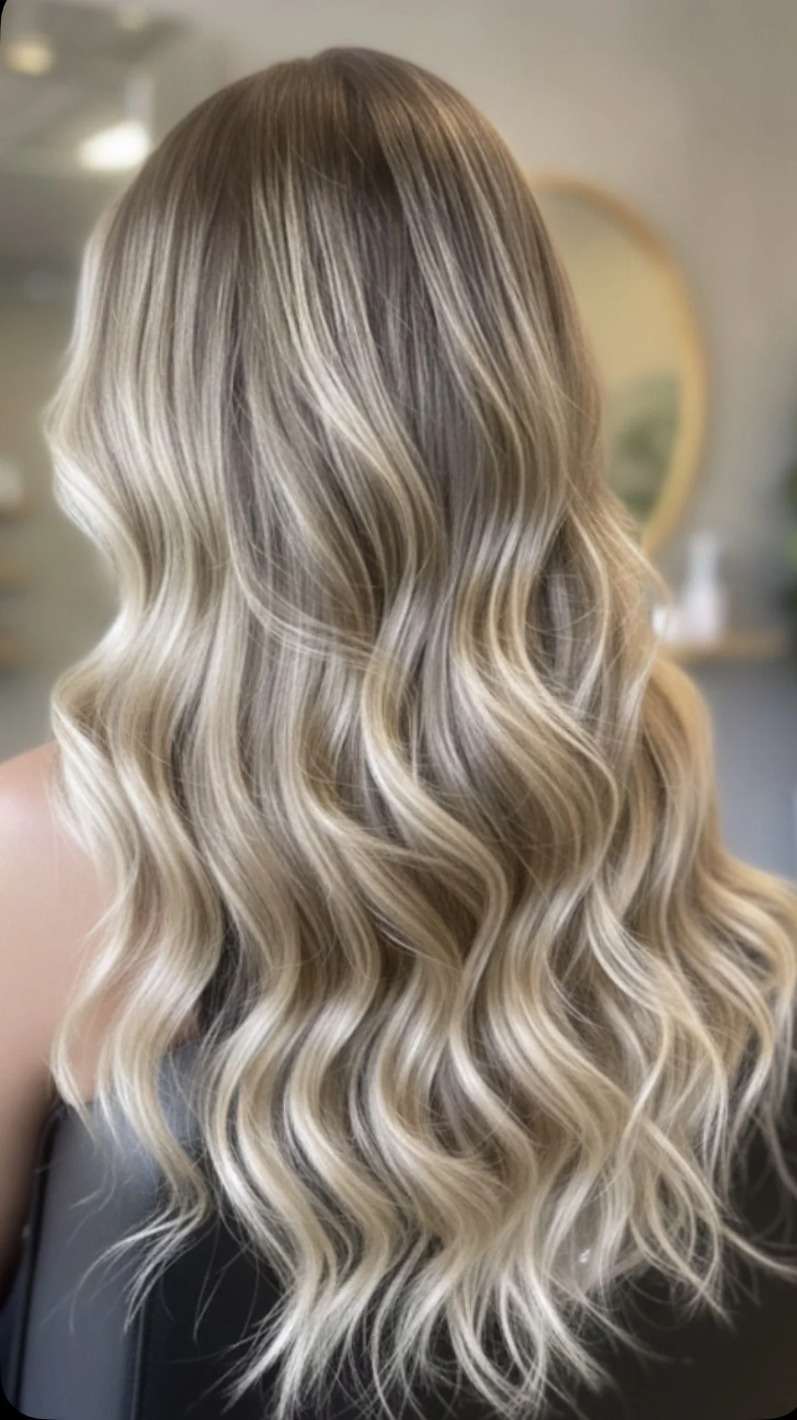 A beautiful lived-in blonde hair colour transformation under the NK Hair lighting Colour Membership.