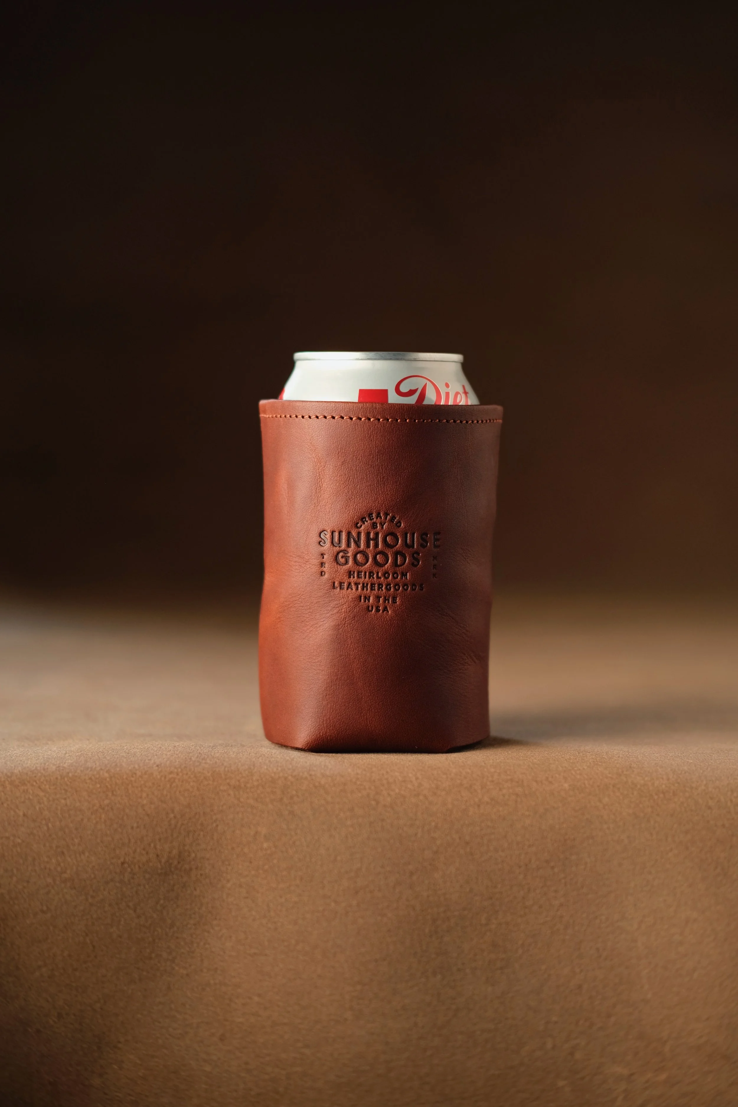 Leather Koozie -
Available with custom logo embossing and personalization.
