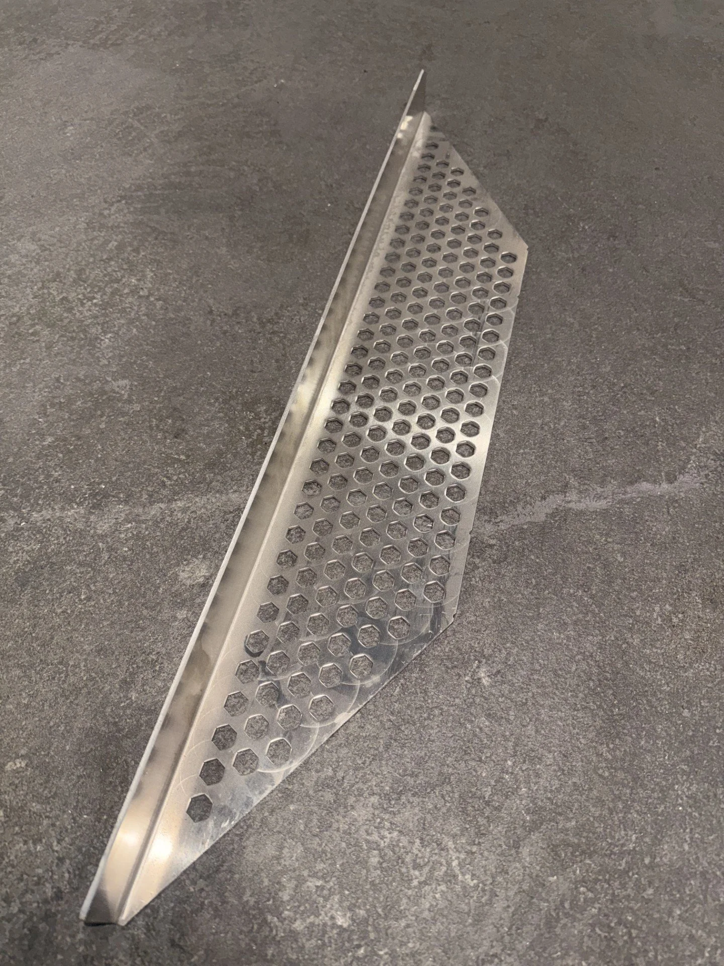 A laser cut and formed sheet metal perforated part in Portland, Oregon