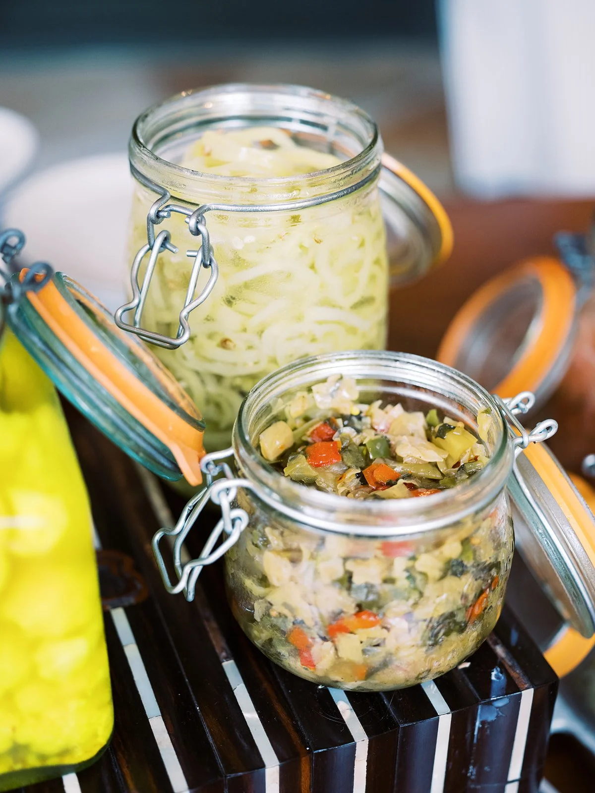 Homemade fermented vegetable relish in glass mason jars, food photography by Cody Myers