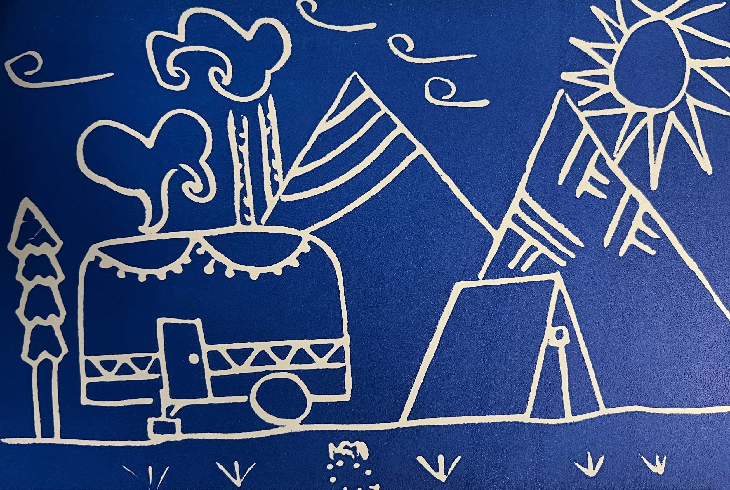 Blue linocut printmaking, Camping trailer in the rocky mountains, Grade 6 art for Father's Day