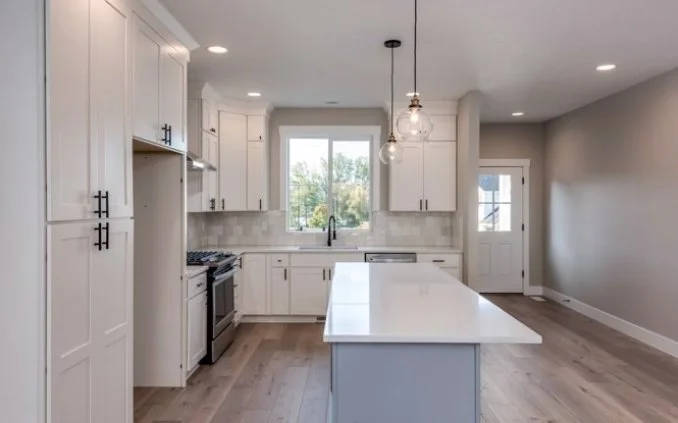 The island and kitchen cabinetry — Keil Street.