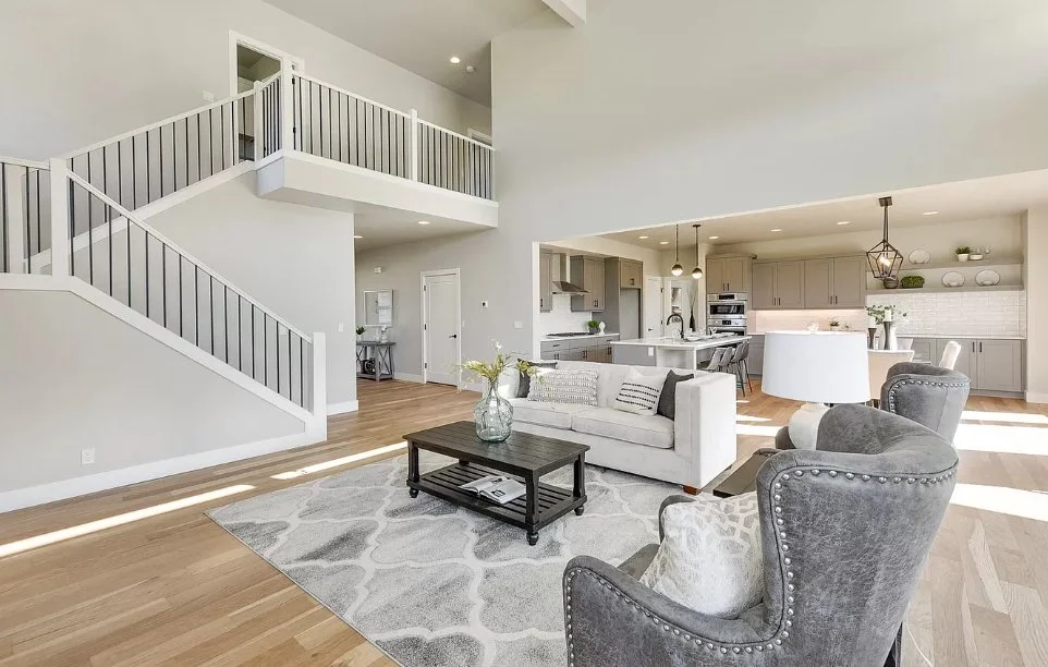 The great room and staircase — Stillwater Lane.