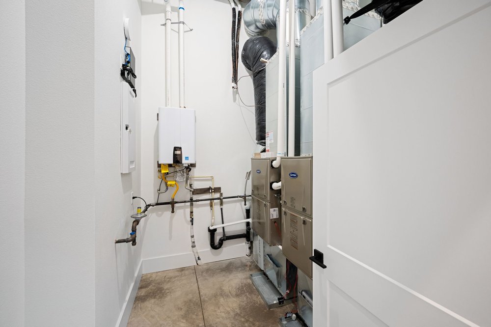 Mechanical room containing the water heater and building equipment.
