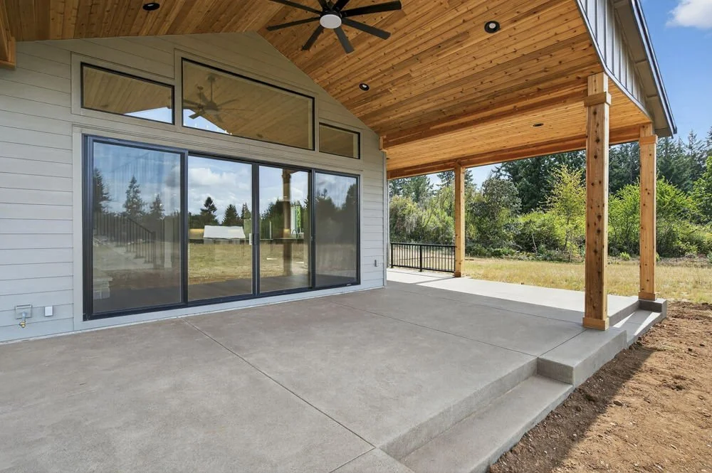 The patio and sliding doors — Carus Road.